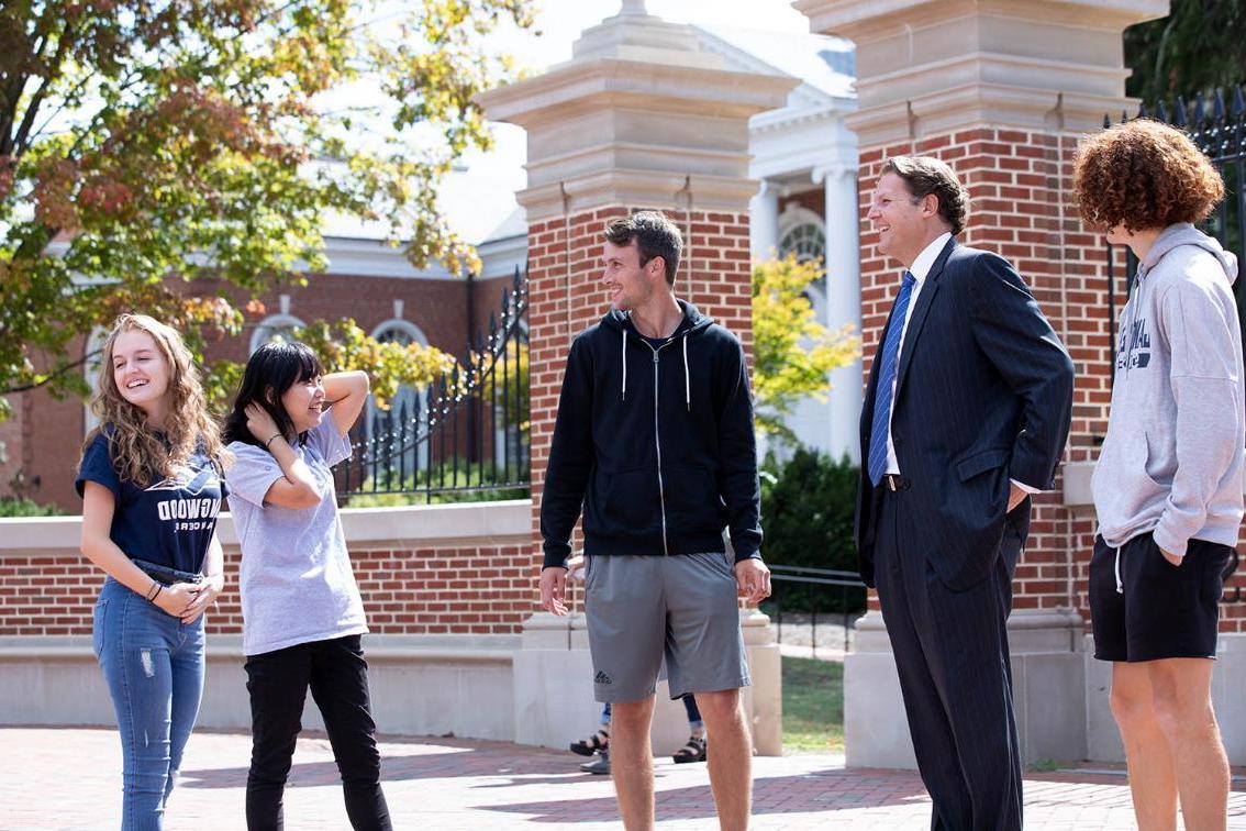 President Reveley talking with students on campus